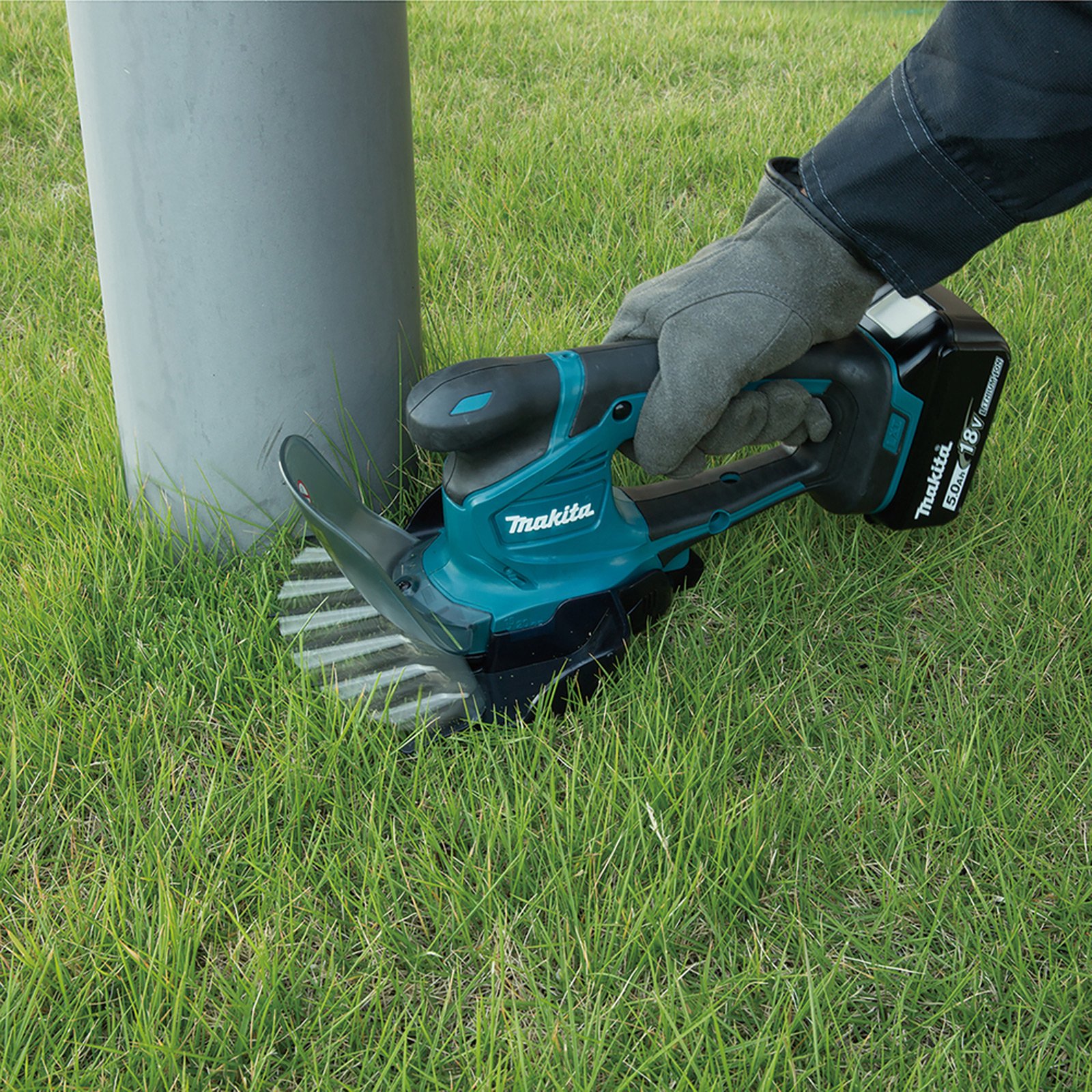 Makita DUM604ZX Akku-Grasschere 18 V Solo inkl. Zubehör-Set