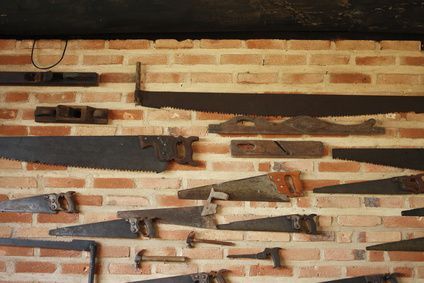 Collection of antique tools hanging